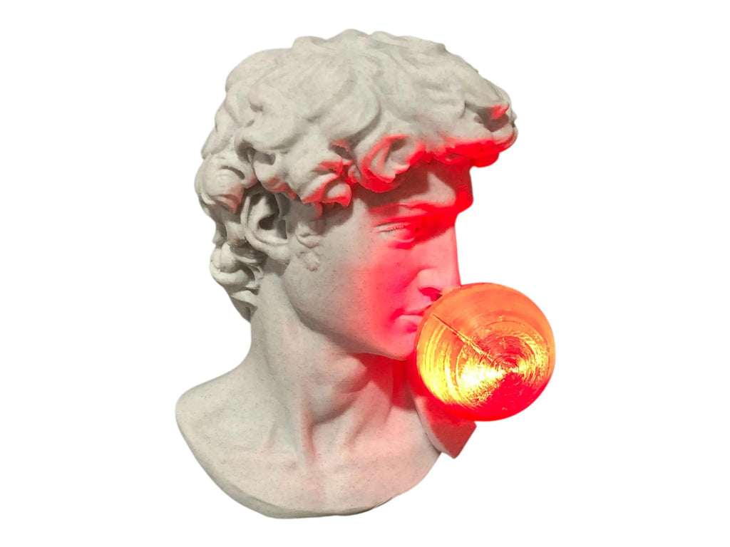 Statue head with a red light bulb on a white background